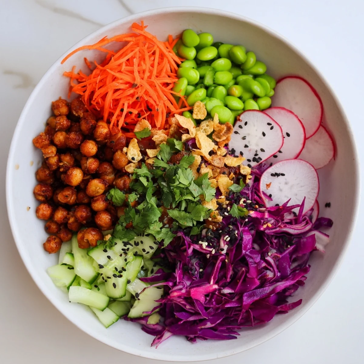 Satisfy your cravings with ASMR Crunch Snack Bowls topped with roasted chickpeas and seeds.