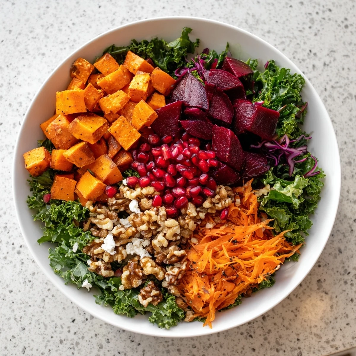 A beautifully plated Hot Girl Winter Salad featuring roasted root vegetables and a zesty dressing.