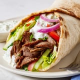 Tender beef shawarma wraps filled with fresh veggies and creamy yogurt sauce.  