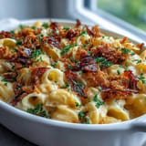 Hearty Chili Crisp Pumpkin Mac and Cheese, showcasing a swirl of spicy chili oil.