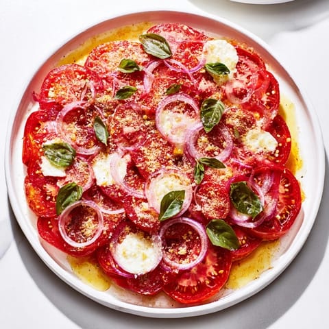 A Mediterranean delight: This Speedy Feta-Free Tomato Bake features tender tomatoes and melted cheese.