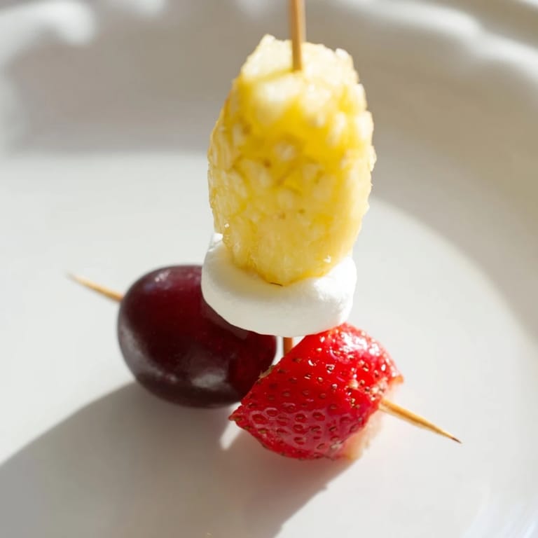 Fresh fruit Christmas Light Fruit Skewers offer a healthy and colorful holiday appetizer, perfect for sharing.